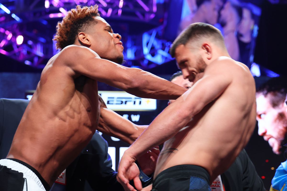 Devin Haney gave Vasiliy Lomachenko a hard shove at today’s weigh-in