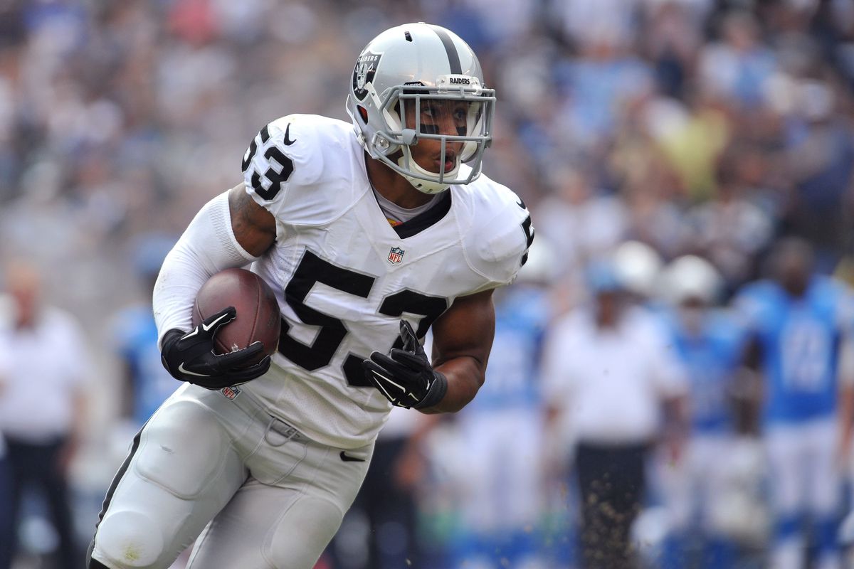Malcolm Smith set the tone early with his interception in the Raiders 37-29 win