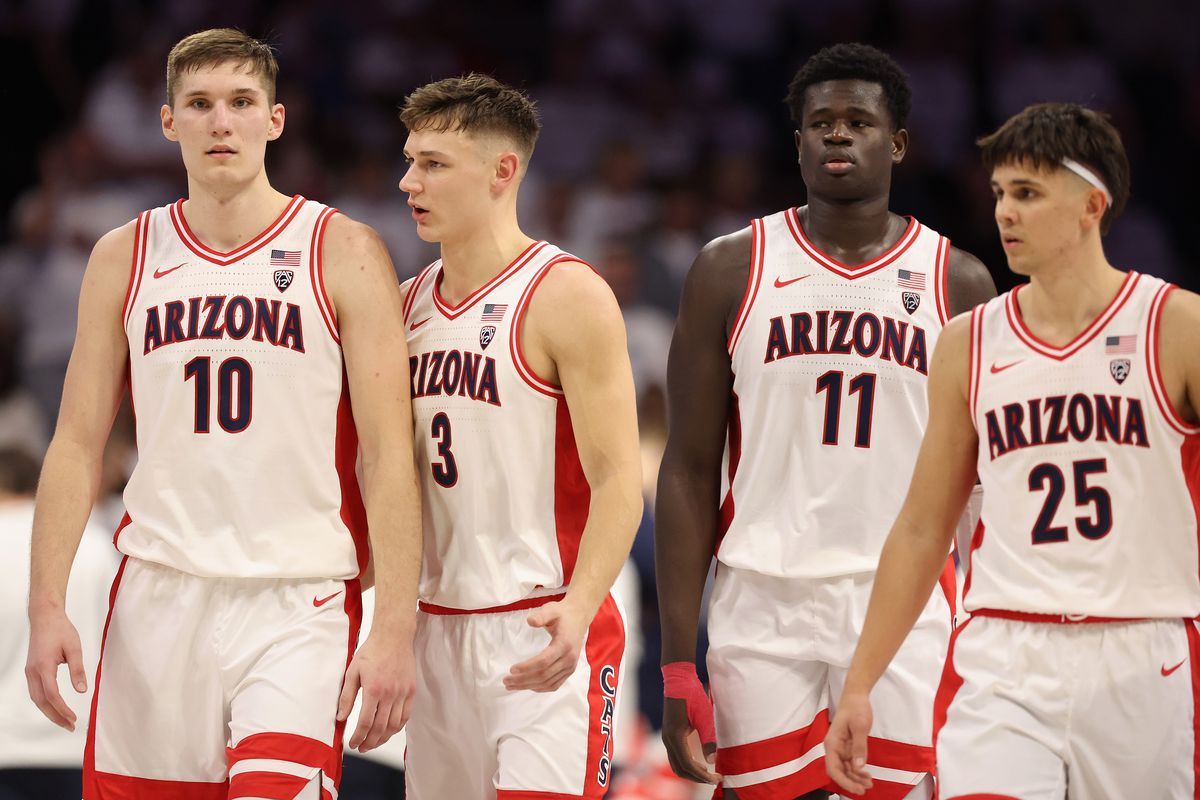 Azuolas Tubelis, Pelle Larsson,, Oumar Ballo and Kerr Kriisa of the Arizona Wildcats walk down the court during the second half of the NCAA game at McKale Center on January 21, 2023 in Tucson, Arizona. The Wildcats defeated the Bruins 58-52.