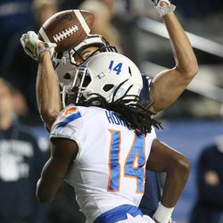 Brigham Young Cougars wide receiver Neil Pau'u (84) can't come up with the balk on the defense from Boise State Broncos cornerback Tyler Horton (14) in Provo on Friday, Oct. 6, 2017.
