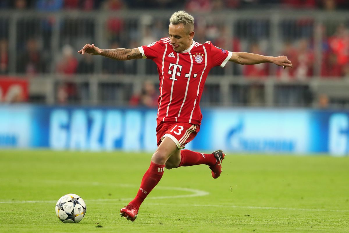 MUNICH, GERMANY - APRIL 11: Rafinha of Bayern Muenchen runs with the ball during the UEFA Champions League Quarter Final Second Leg match between Bayern Muenchen and Sevilla FC at Allianz Arena on April 11, 2018 in Munich, Germany.