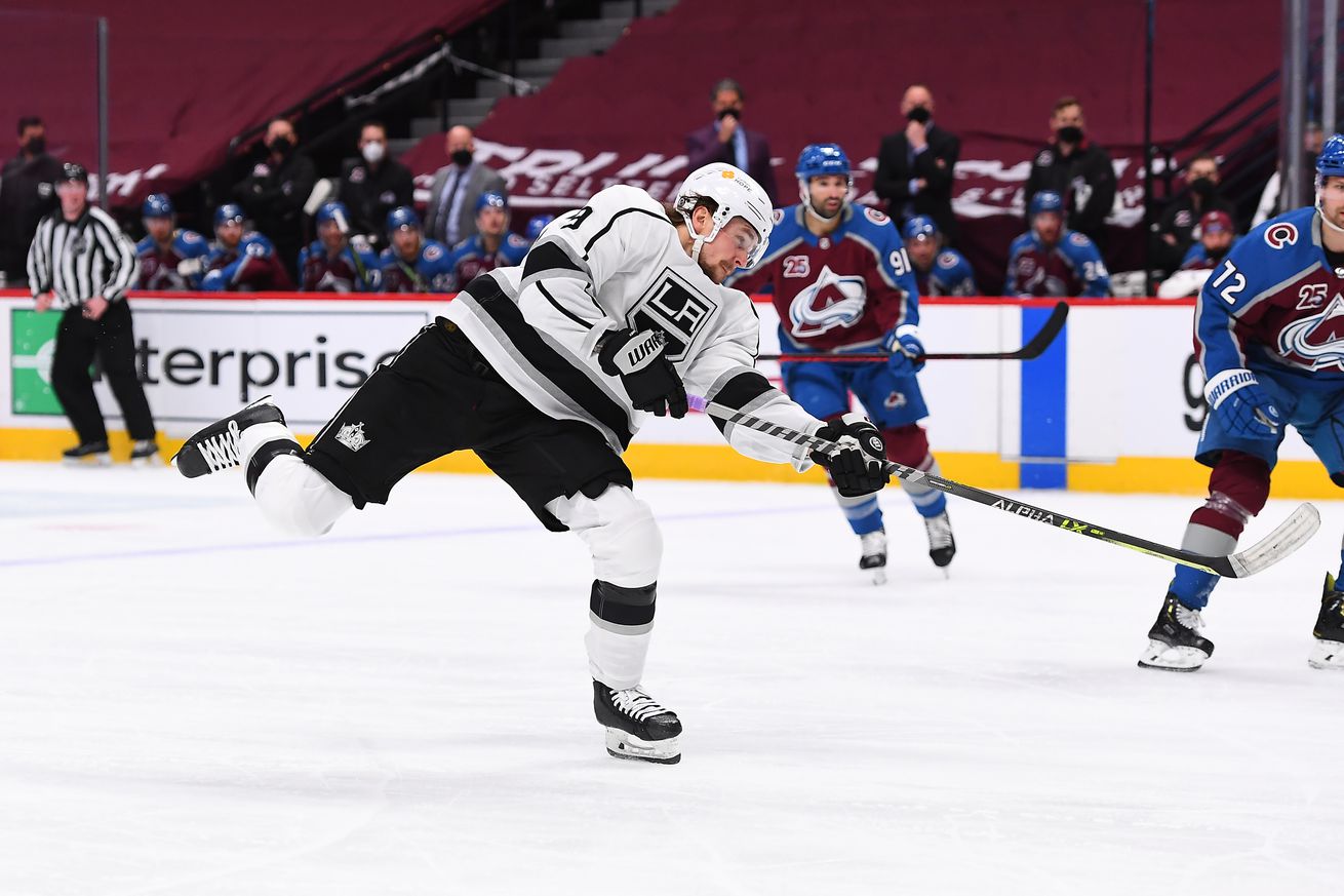 May 13, 2021; Denver, Colorado, USA; Los Angeles Kings right wing Adrian Kempe (9) takes a shot on net of the Colorado Avalanche during the third period at Ball Arena.