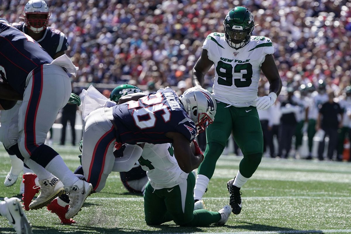 New England Patriots running back Sony Michel scores a touchdown against the New York Jets in the first quarter at Gillette Stadium.