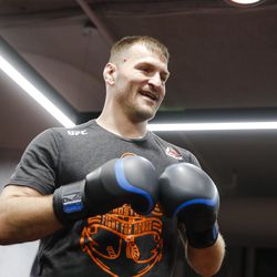 Stipe Miocic smiles during UFC 220 workouts.