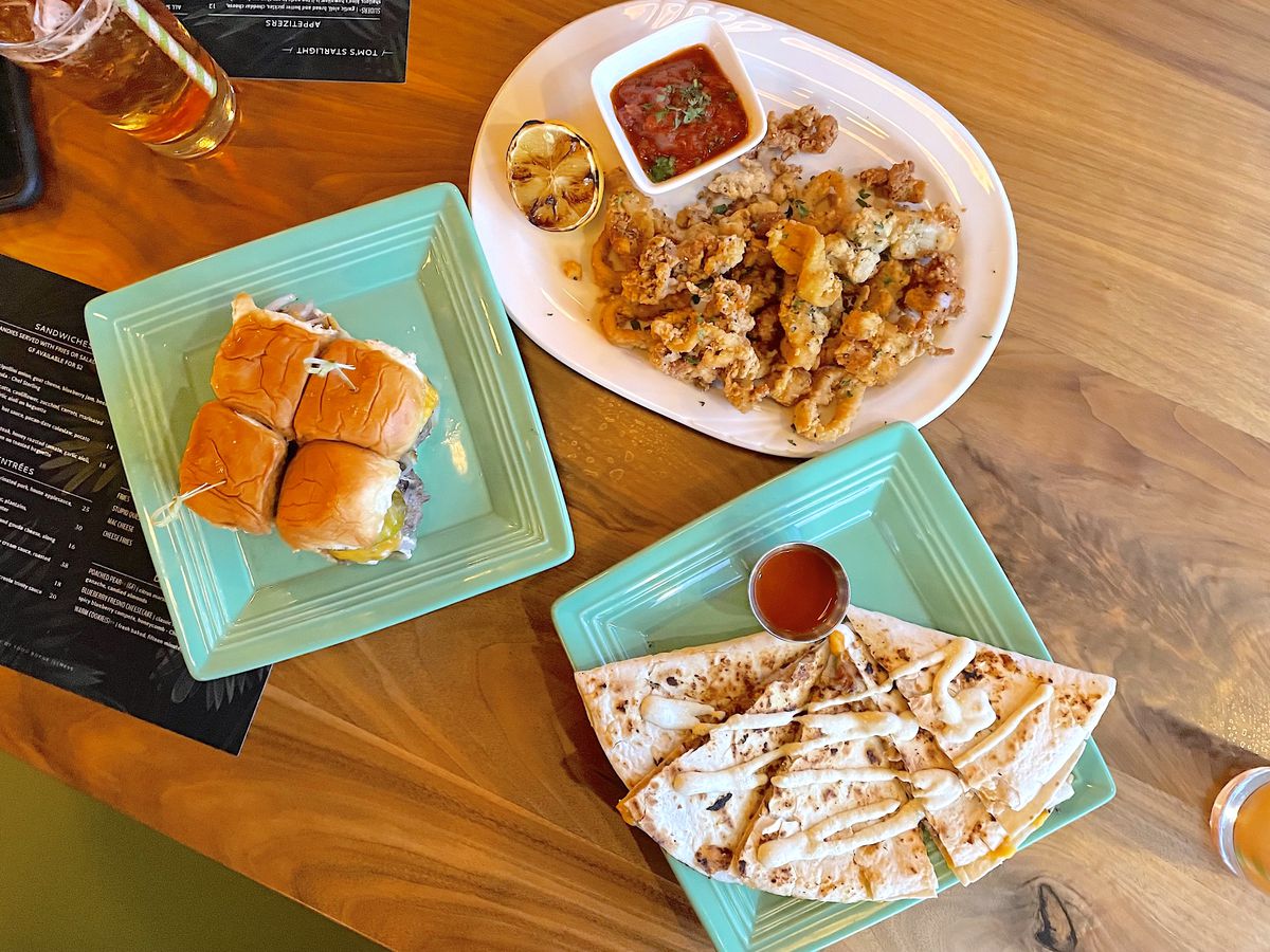 Sliders, fried calamari, and the pulled-pork quesadilla at Tom’s Starlight