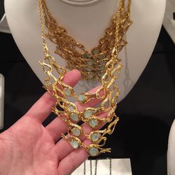Gold necklace, $95