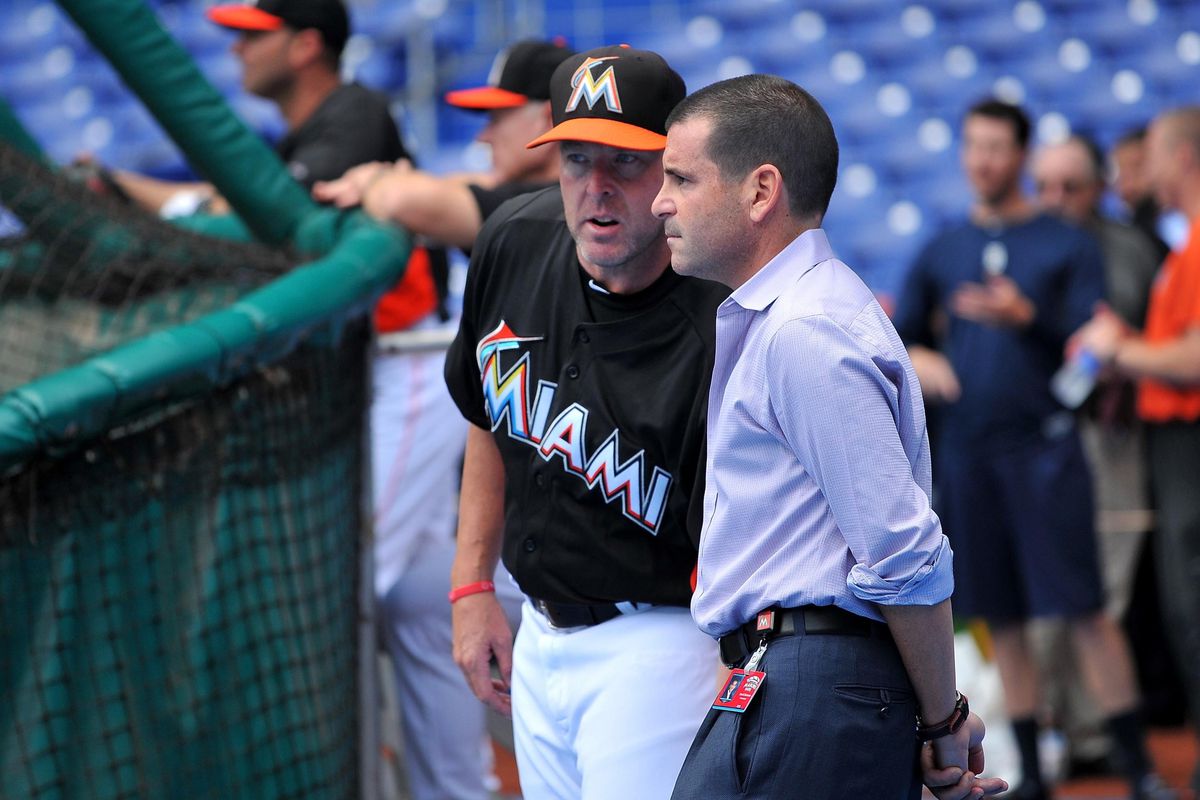 How can Mike Redmond and the Miami Marlins back up David Samson's promise of avoiding 100 losses?