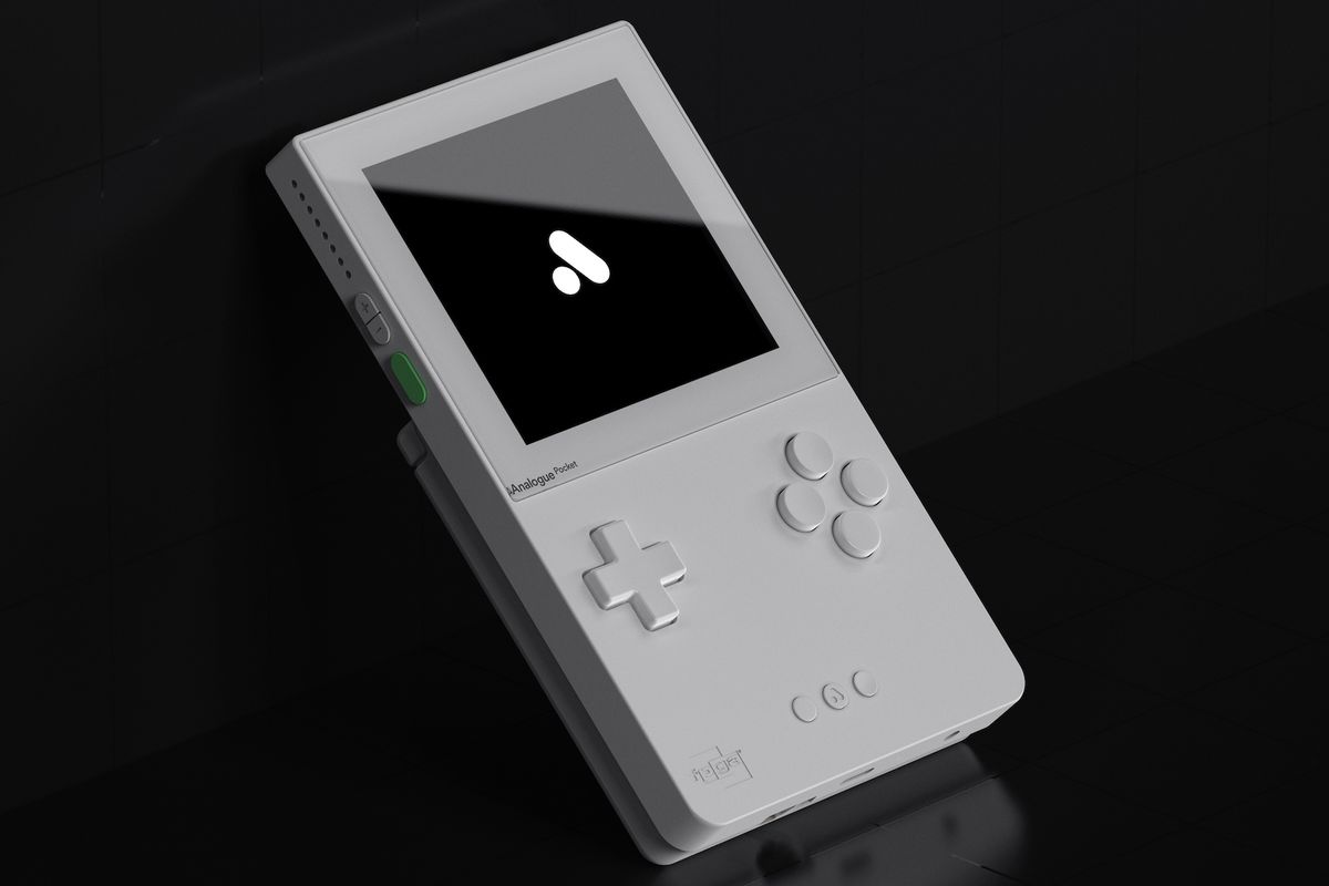 A product shot of the Analogue Pocket handheld in white on a black background