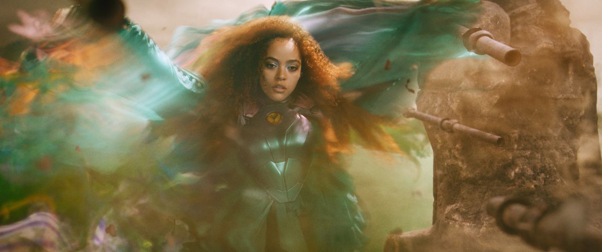 Quintessa Swindell as Cyclone uses her wind powers in a swirl of blurred CGI color in Black Adam