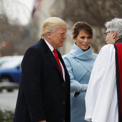Rev. Luis Leon greets President-elect Donald Trump and his wife Melania as they arrive for a church service at St. John’s Episcopal Church across from the White House in Washington, Friday, Jan. 20, 2017, on Donald Trump's inauguration day. A leaked copy of a draft of an executive order on religious freedom was released by The Nation on Wednesday that would provide broad protections Trump promised to religious conservative supporters.