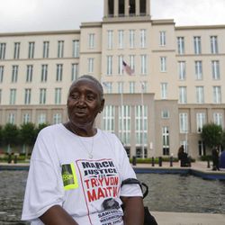 Betty Sharpe wearing a tee-shirt in support of Trayvon Martin sits outside the Seminole County Courthouse during the first day of trial for George Zimmerman, Monday, June 10, 2013, in Sanford, Fla. Zimmerman has been charged with second-degree murder for the 2012 shooting death of Trayvon Martin. (AP Photo/John Raoux)