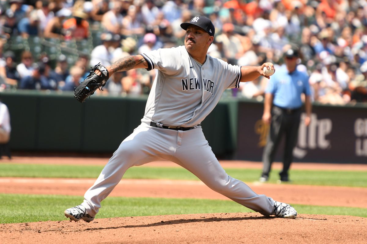 Nestor Cortes #65 of the New York Yankees pitches in the second inning during a baseball game against the Baltimore Orioles at Oriole Park at Camden Yards on July 24, 2022 in Baltimore, Maryland.