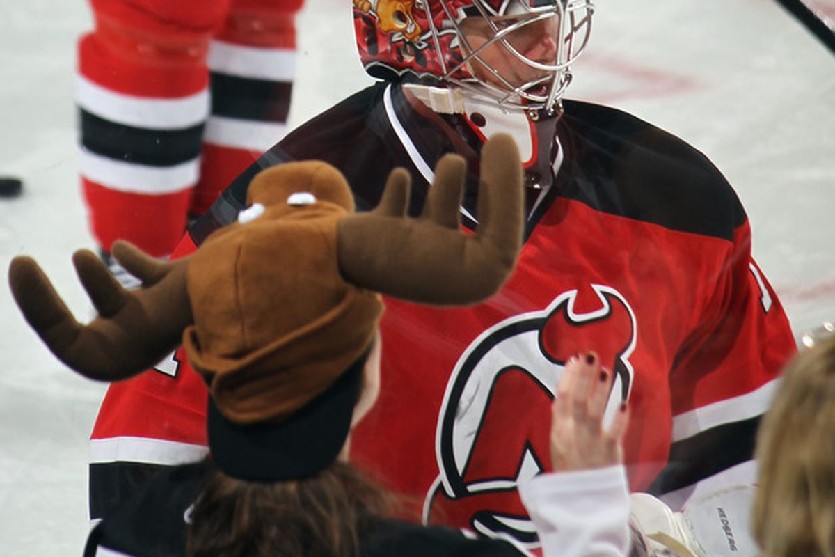 Let's take a closer look at the Moose.  Rather, the goals he allowed in 2011-12.   Not his mask for the hat the fan is wearing, both are clear enough. (Photo by Bruce Bennett/Getty Images)