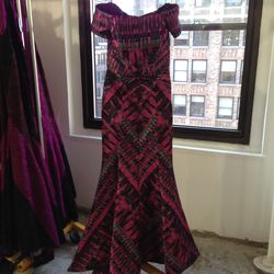 Jacquard gown, $1,225 (original $4.900)