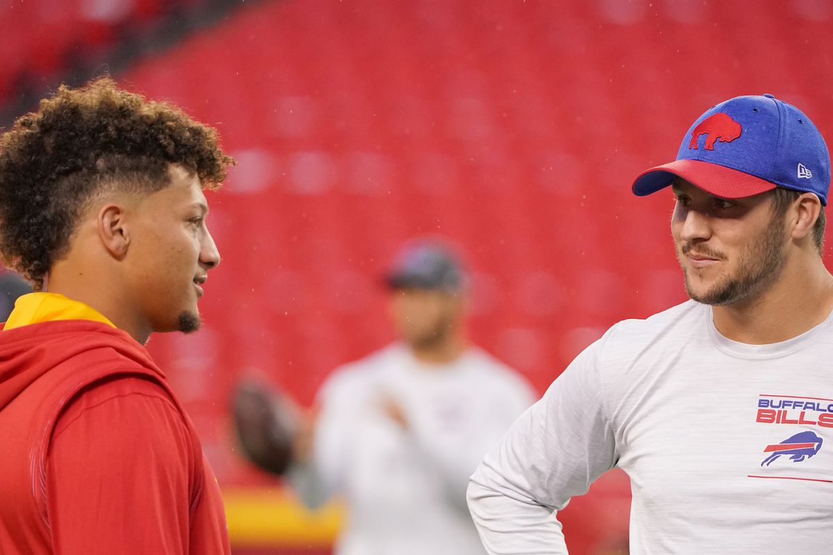 Kansas City Chiefs quarterback Patrick Mahomes (15) talks with Buffalo Bills quarterback Josh Allen (17) before warm ups at GEHA Field at Arrowhead Stadium.&nbsp;