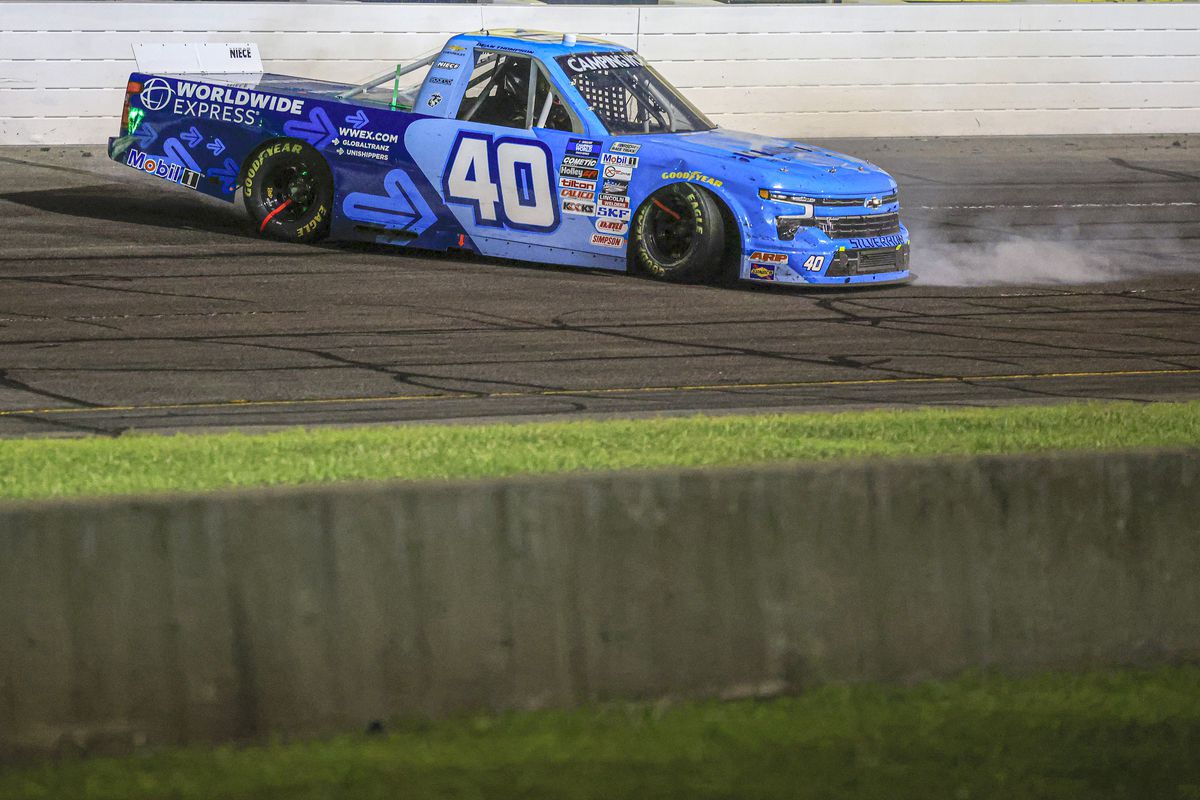 Dean Thompson, driver of the #40 Worldwide Express Chevrolet, spins after an on-track incident during the NASCAR Camping World Truck Series TSport 200 at Indianapolis Raceway Park on July 29, 2022 in Indianapolis, Indiana.