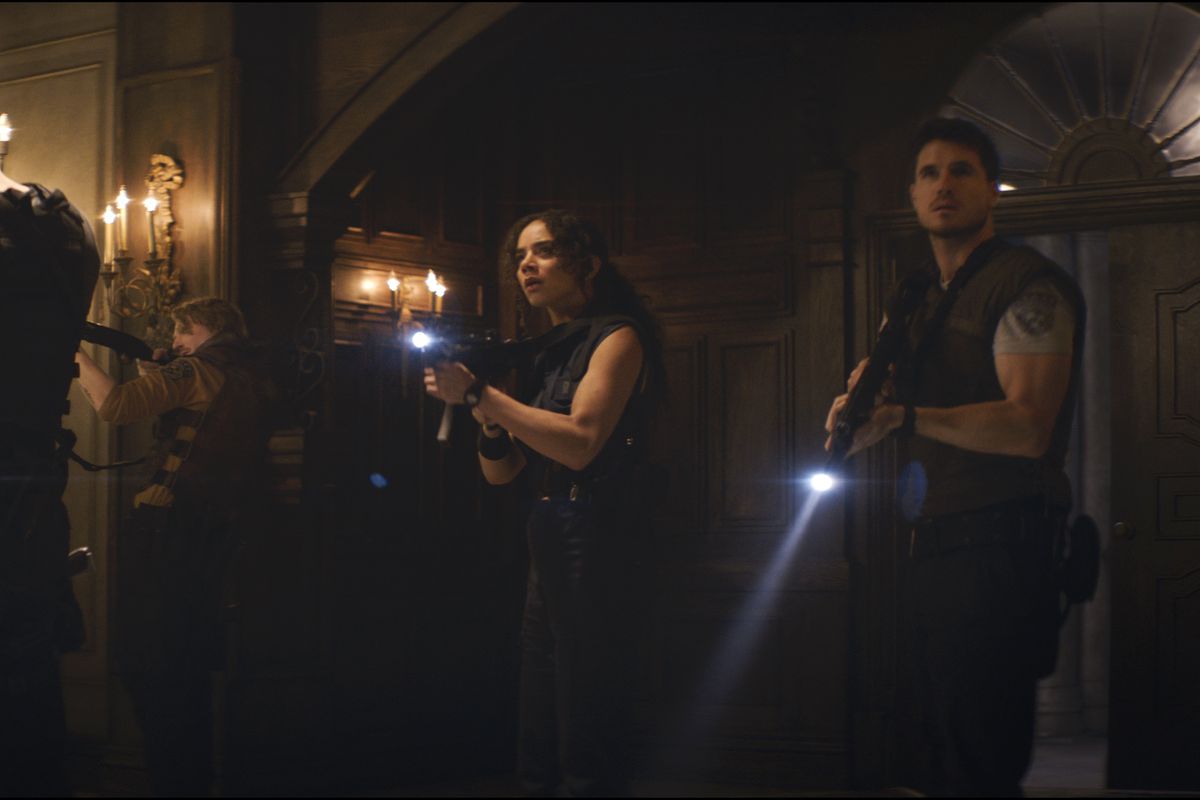 Wesker, Jill, and Chris enter the Spencer Mansion in Resident Evil: Welcome to Raccoon City