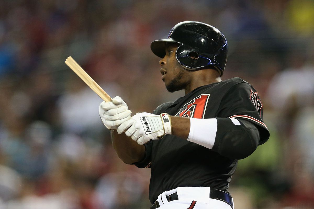 PHOENIX, AZ - JULY 07:  Justin Upton #10 of the Arizona Diamondbacks breaks his bat as he hits against the Los Angeles Dodgers during the MLB game at Chase Field on July 7, 2012 in Phoenix, Arizona.  (Photo by Christian Petersen/Getty Images)