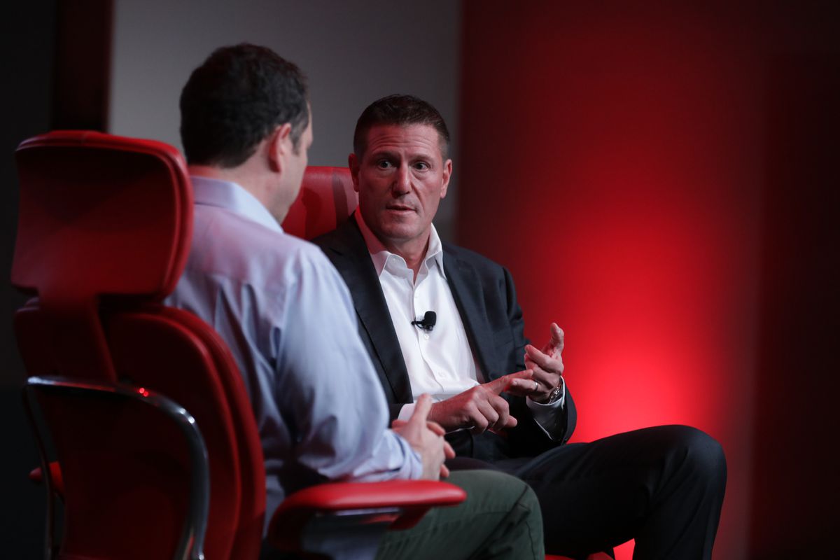 Disney’s Kevin Mayer sitting onstage with Recode’s Peter Kafka at the 2019 Code Media conference.