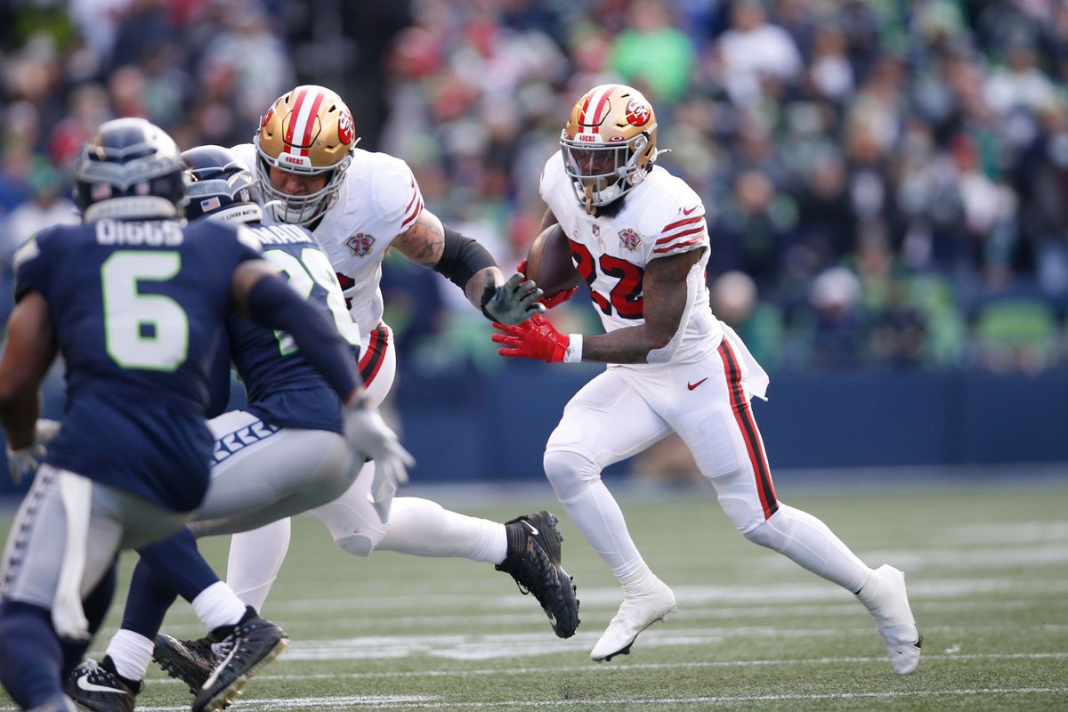 Jeff Wilson Jr. #22 of the San Francisco 49ers rushes during the game against the Seattle Seahawks at Lumen Field on December 5, 2021 in Seattle, Washington.