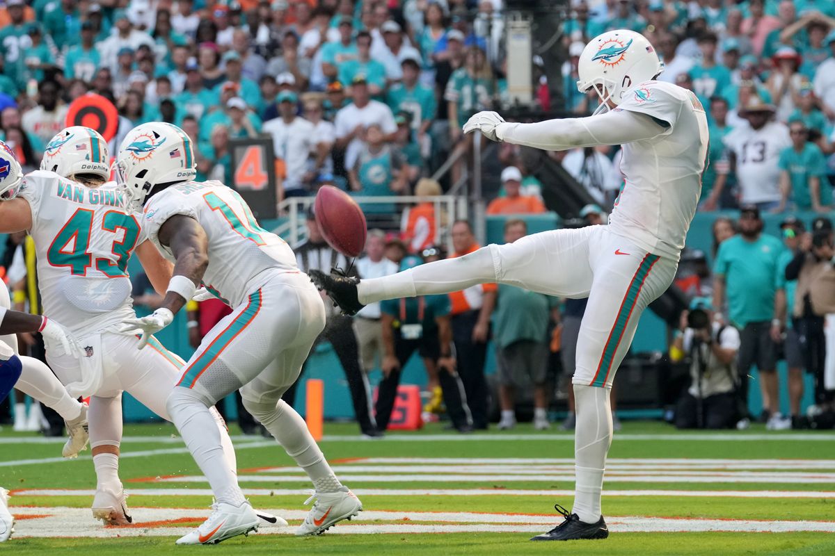 Thomas Morstead #4 of the Miami Dolphins has his punt blocked by his own player in the fourth quarter of the game against the Buffalo Bills at Hard Rock Stadium on September 25, 2022 in Miami Gardens, Florida.