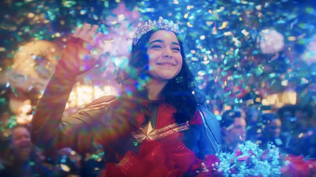 Kamala Khan waves in her Ms. Marvel costume