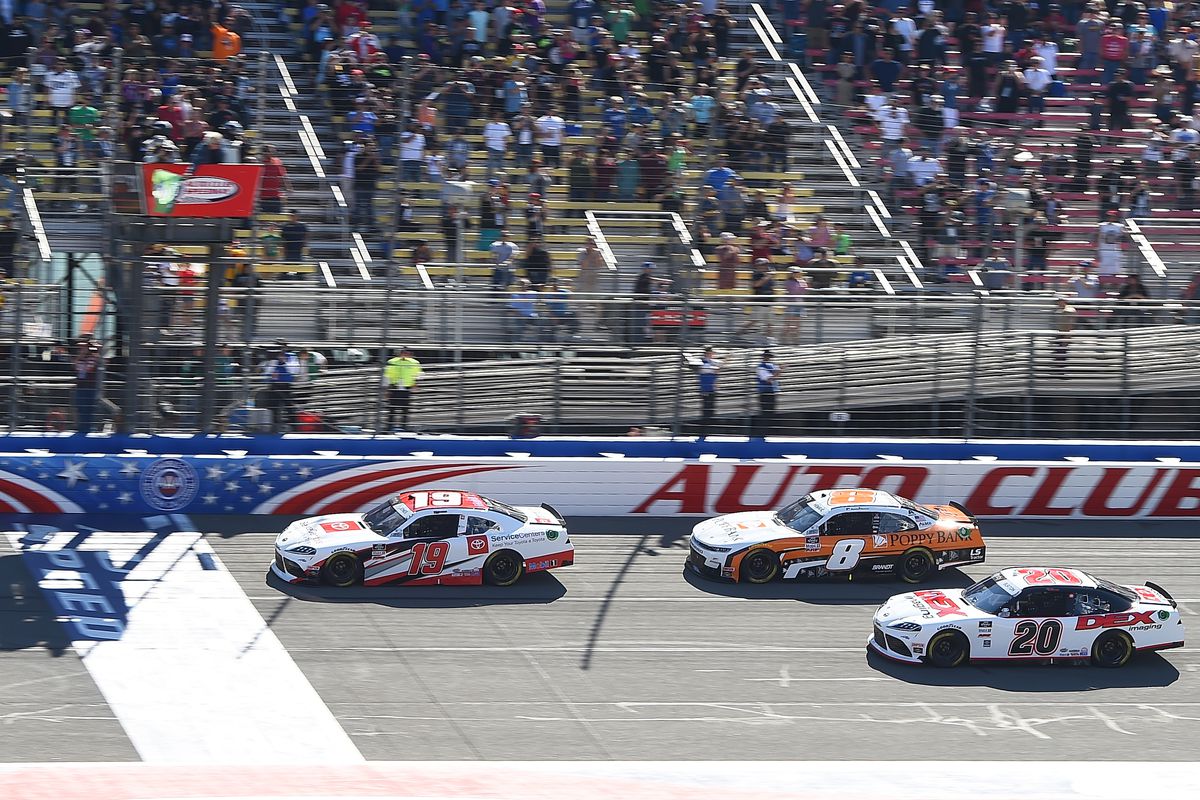 Brandon Jones, driver of the #19 Toyota Service Centers Toyota, takes the green flag to start the NASCAR Xfinity Series Production Alliance Group 300 at Auto Club Speedway on February 29, 2020 in Fontana, California.