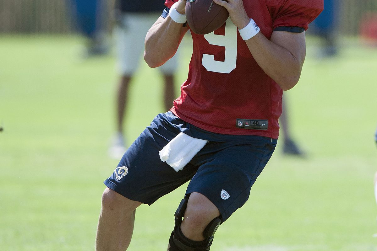 July 27, 2012; St. Louis, MO, USA; St. Louis Rams quarterback Austin Davis (9) drops back to pass during training camp at ContinuityX Training Center. Mandatory Credit: Jeff Curry-US PRESSWIRE