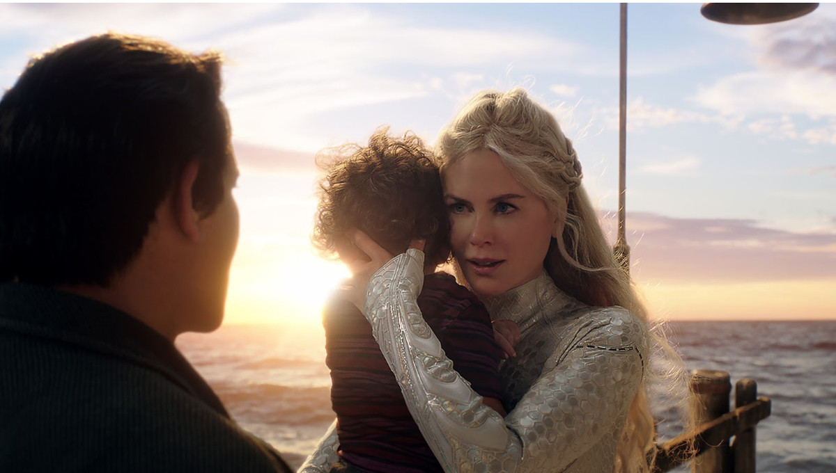 Nicole Kidman holding a child