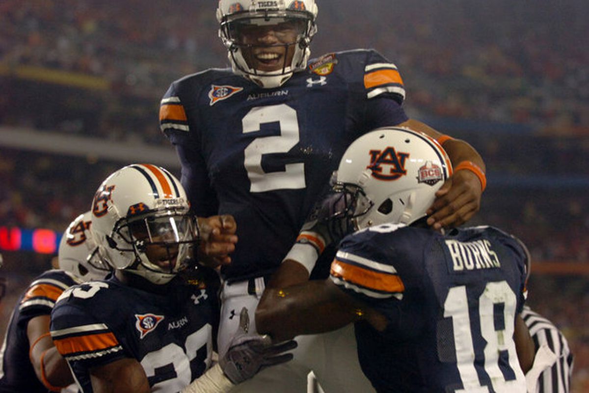 Cam Newton Celebrates Winning The BCS National Championship with teammates.

<em>(Photo by Hal Yeager, The BIrmingham News)</em>
