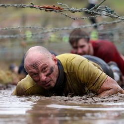 A competitor in action during the Tough Guy Challenge on January 27, 2013 in Telford, England.