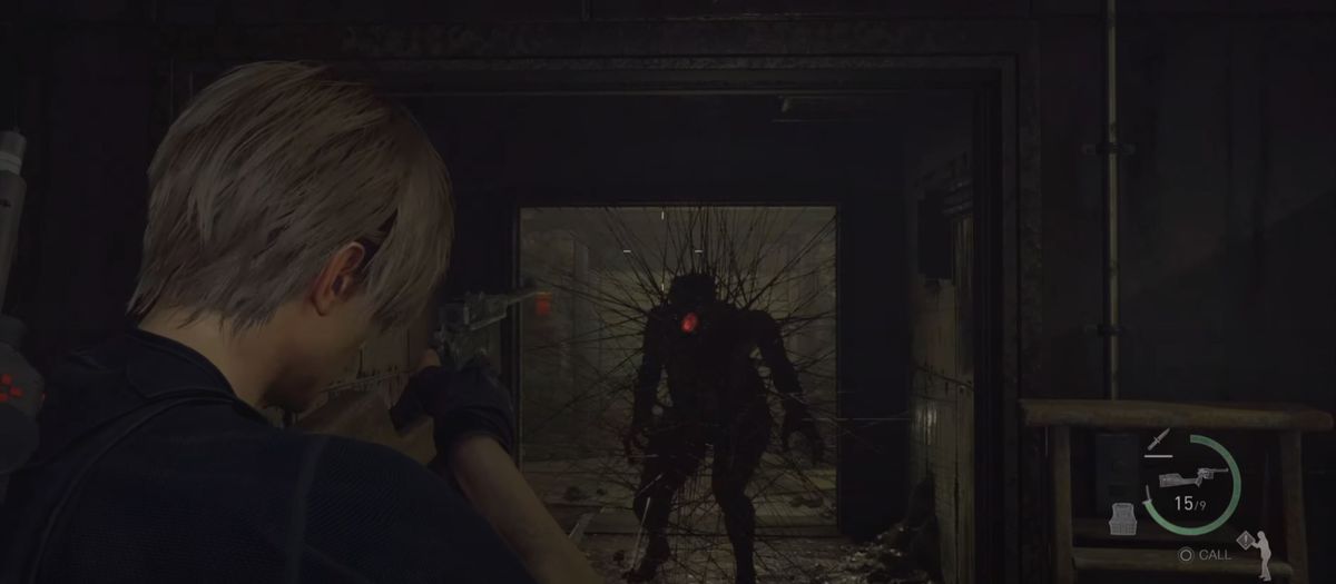 Leon Kennedy takes aim at an oncoming Iron Maiden enemy in Resident Evil 4