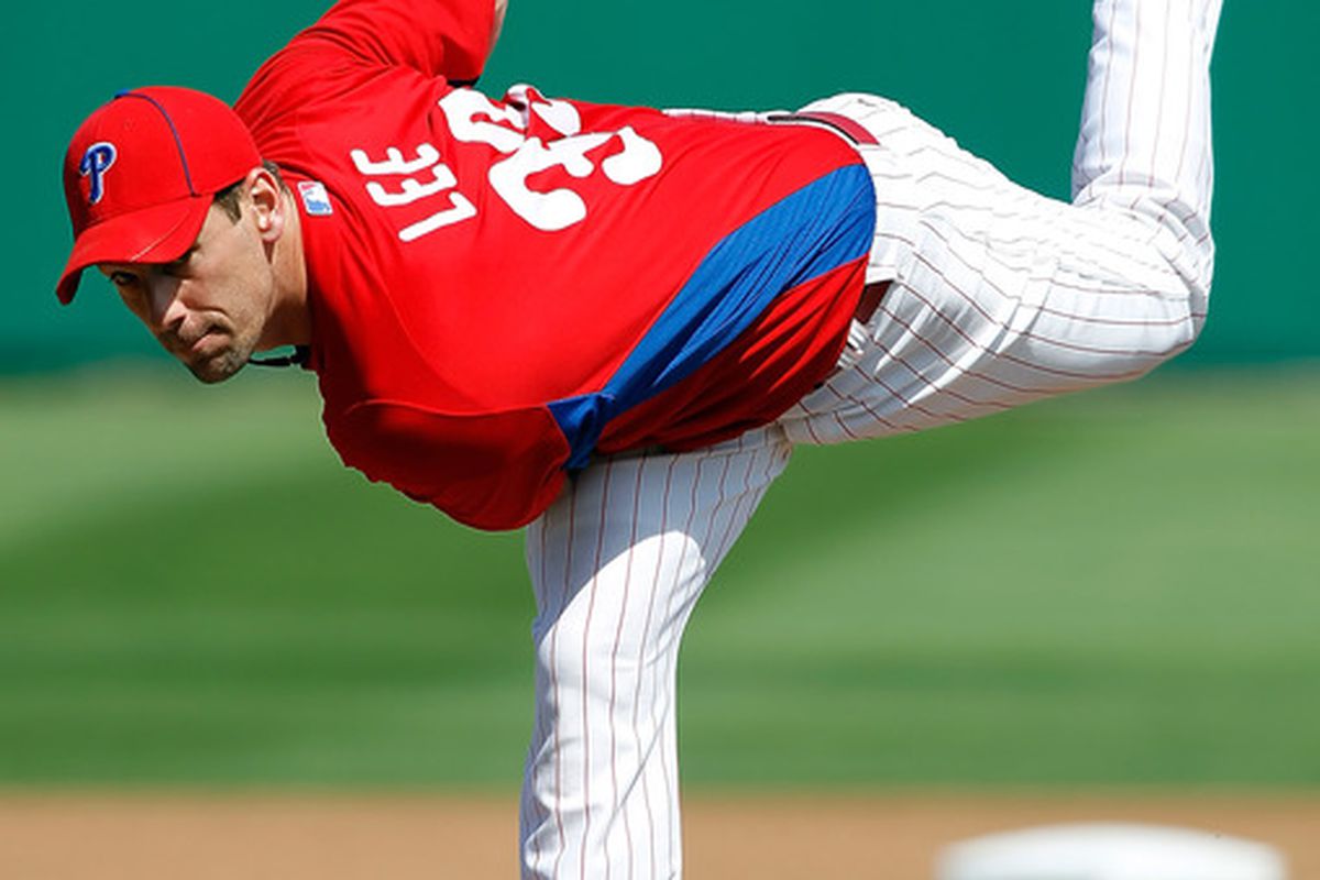 This story is a bit of a bummer, so we figured a nice pic of CLIFF LEE doing his thing might help it go down easier. (Photo by J. Meric/Getty Images)