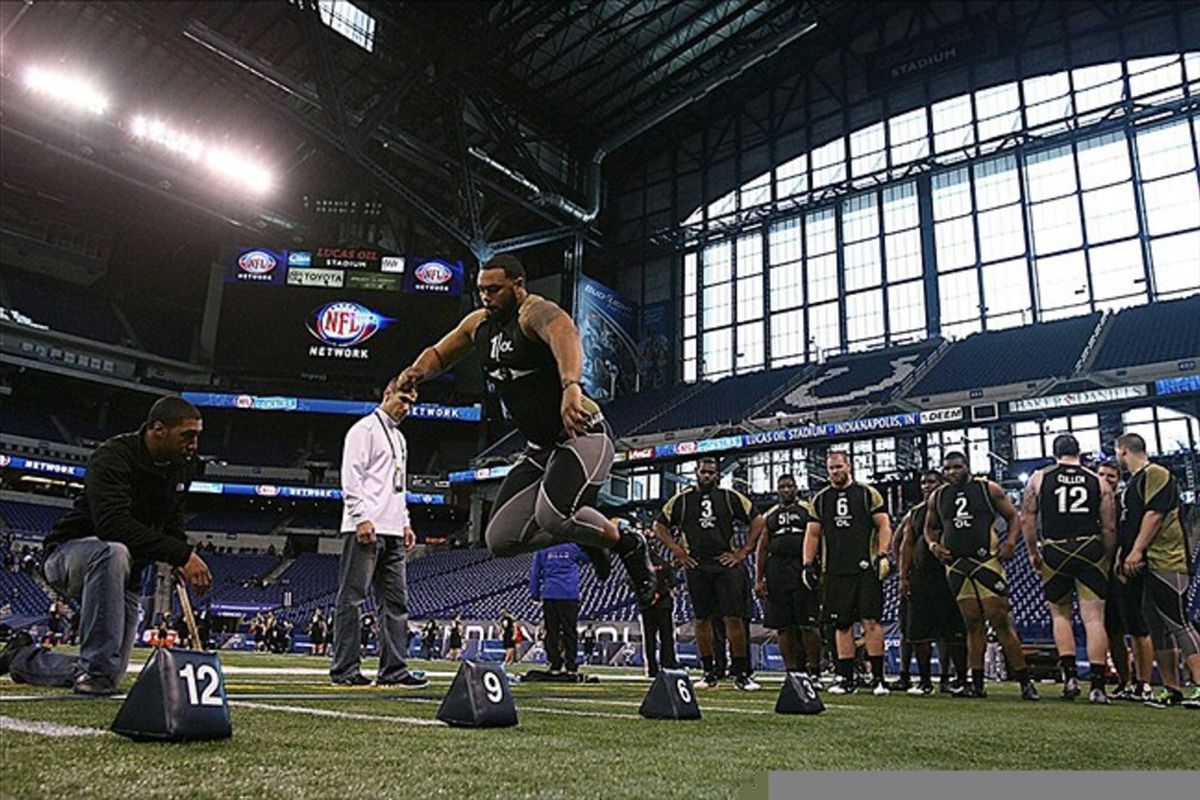 Feb 25, 2012; Indianapolis, IN, USA; Ohio State Buckeyes offensive lineman Mike Adams does the broad jump during the NFL Combine at Lucas Oil Stadium. Mandatory Credit: Brian Spurlock-US PRESSWIRE