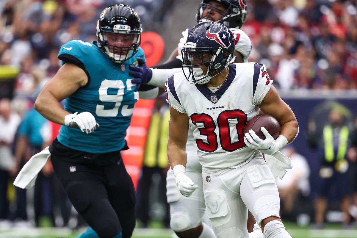 Houston Texans running back Phillip Lindsay (30) runs with the ball during the game against the Jacksonville Jaguars at NRG Stadium.