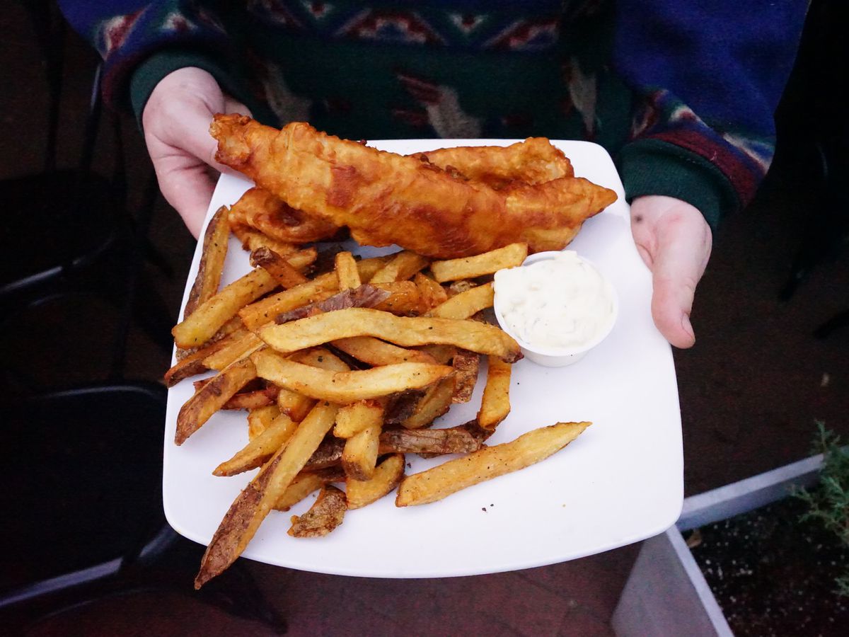 Fish and chips on a white plate