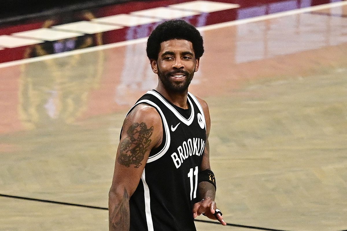 Kyrie Irving of the Brooklyn Nets celebrates his teams lead late in the game against the Boston Celtics in Game One of the First Round of the 2021 NBA Playoffs at Barclays Center at Barclays Center on May 22, 2021 in New York City.
