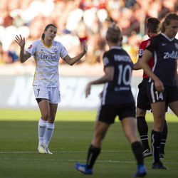 Utah Royals FC midfielder Mandy Laddish (7) holds up her hands after contesting a call from the referee against the Seattle Reign FC during their match at Rio Tinto Stadium in Sandy on Friday, June 28, 2019.