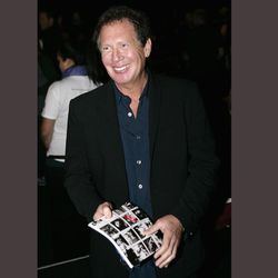 FILE - In this Oct. 17, 2006 file photo, actor Garry Shandling poses for photographers before the Jennifer Nicholson fashion show during Mercedes Benz Fashion Week in Culver City, Calif. Shandling, who as an actor and comedian pioneered a pretend brand of self-focused docudrama with "The Larry Sanders Show," died, Thursday, March 24, 2016 of an undisclosed cause in Los Angeles. He was 66. 