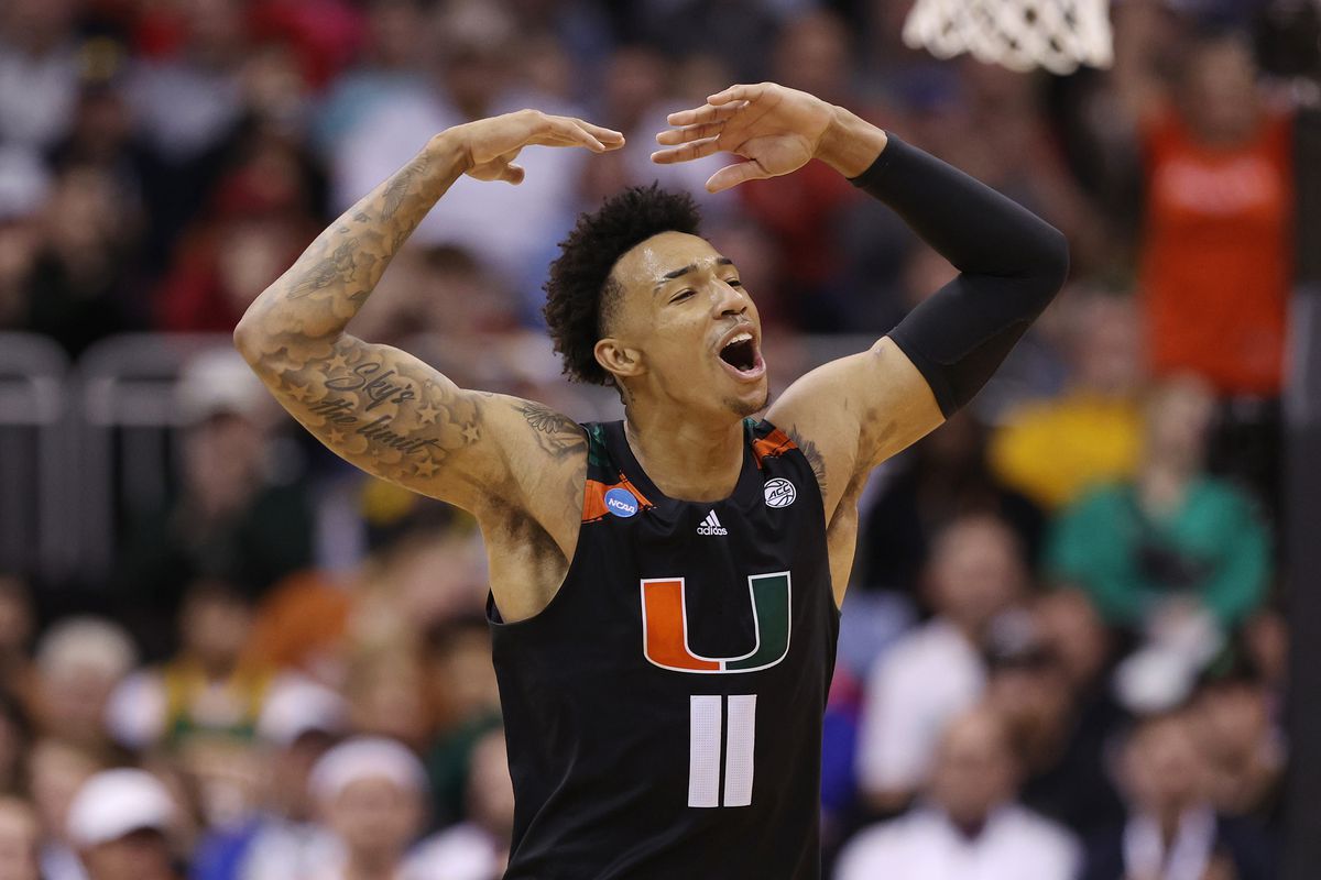 Jordan Miller of the Miami Hurricanes celebrates during the second half against the Texas Longhorns in the Elite Eight round of the NCAA Men’s Basketball Tournament at T-Mobile Center on March 26, 2023 in Kansas City, Missouri.