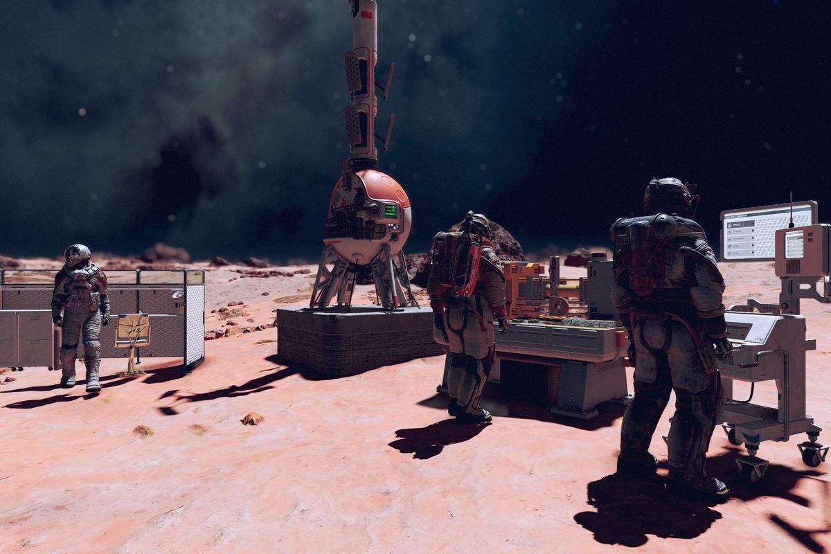 Three crew members stand around an outpost in Starfield.