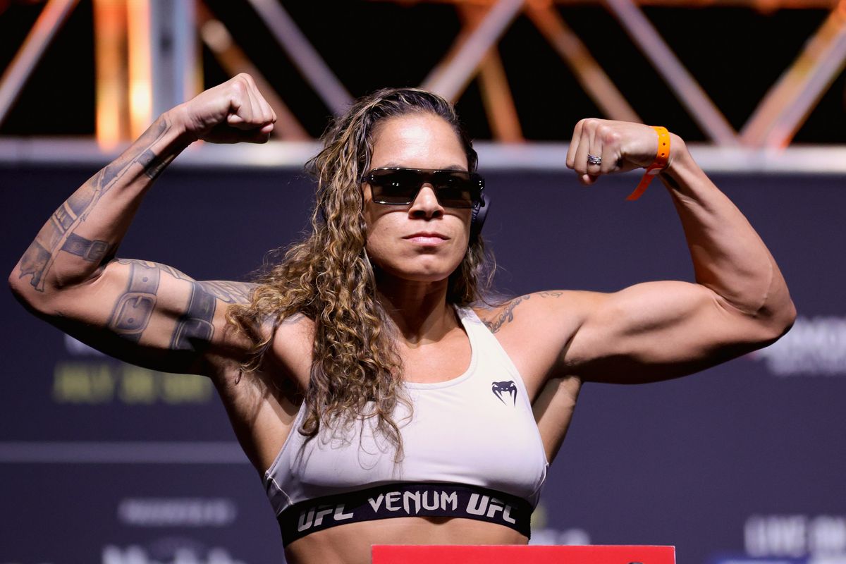 Amanda Nunes of Brazil poses on the scale during the UFC 277 ceremonial weigh-in at American Airlines Center on July 29, 2022 in Dallas, Texas.