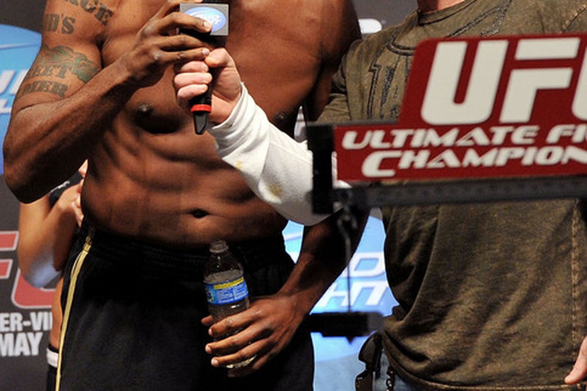 LAS VEGAS - MAY 28:  UFC fighter Quinton "Rampage" Jackson (L) speaks to Joe Rogan (R) (Photo by Jon Kopaloff/Getty Images)