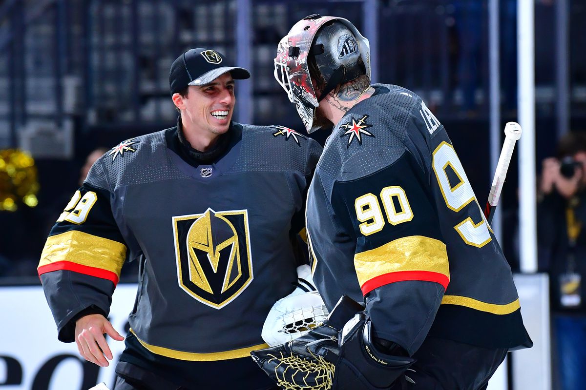 Las Vegas, Nevada, USA; Vegas Golden Knights goaltender Robin Lehner is congratulated by goaltender Marc-Andre Fleury after shutting out the New Jersey Devils 3-0 game at T-Mobile Arena.&nbsp;
