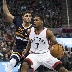 Utah guard Raul Neto (25) pressures Toronto guard Kyle Lowry (7) during an NBA basketball game in Salt Lake City on Friday, Dec. 23, 2016. Toronto took down Utah with a final score of 104-98.