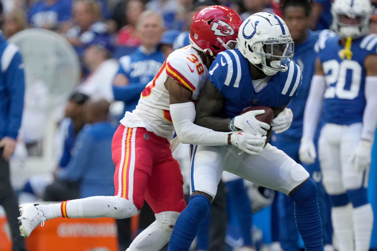 Kansas City Chiefs cornerback L’Jarius Sneed (38) wraps up Indianapolis Colts wide receiver Parris Campbell (1) on Sunday, Sept. 25, 2022, during a game against the Kansas City Chiefs at Lucas Oil Stadium in Indianapolis.