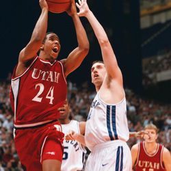 University of Utah's Andre Miller drives past Kentucky's Scott Padgett during the 1998 NCAA Championship basketball game in San Antonio.