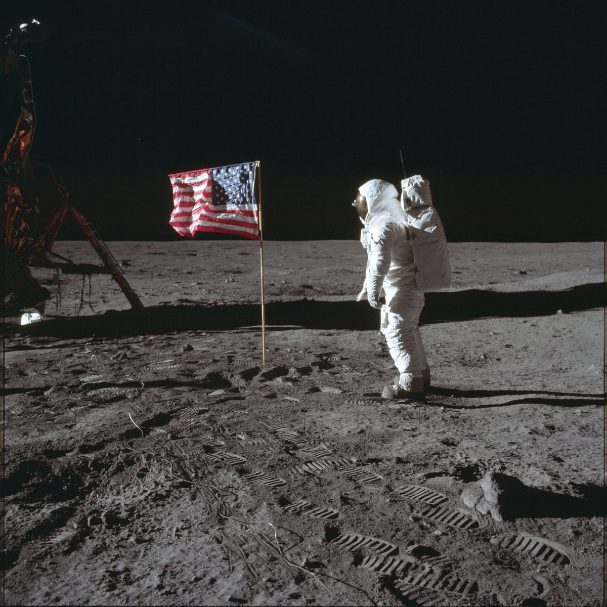FILE - In this July 20, 1969 photo made available by NASA, astronaut Buzz Aldrin Jr. poses for a photograph beside the U.S. flag on the moon during the Apollo 11 mission. Aldrin and fellow astronaut Neil Armstrong were the first men to walk on the lunar s