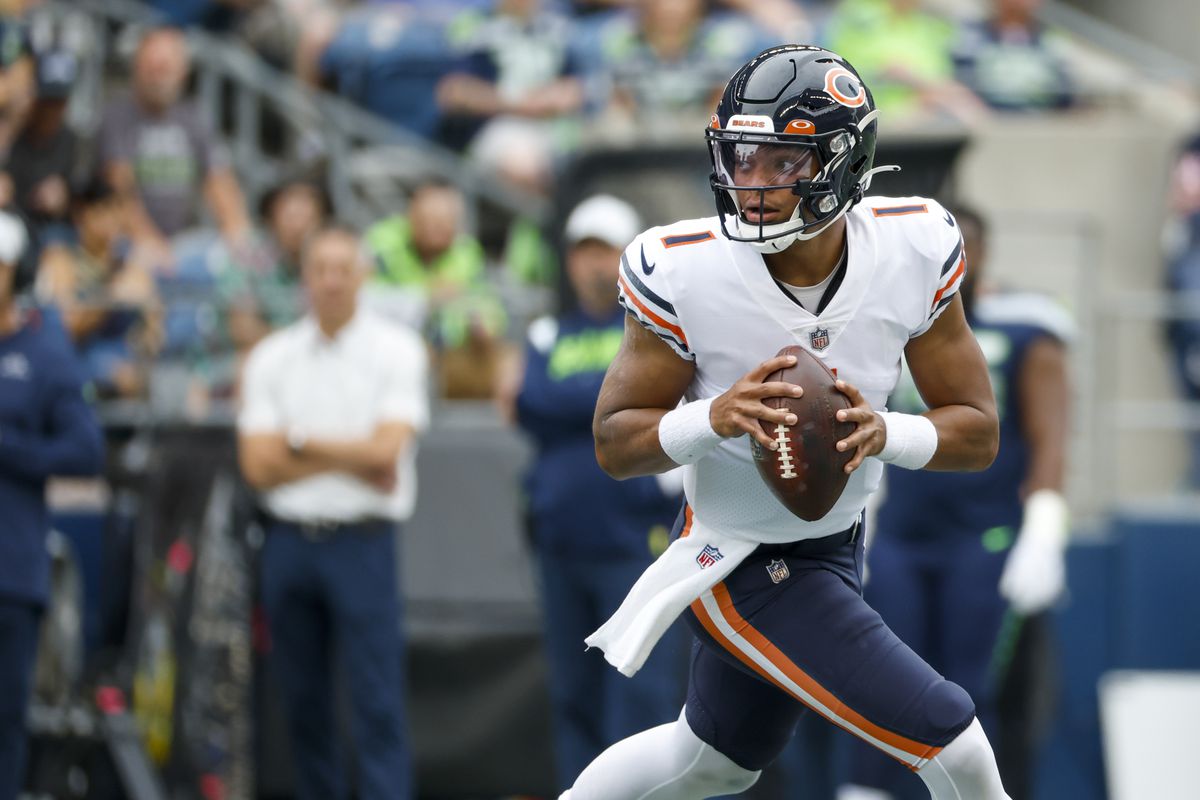 Chicago Bears quarterback Justin Fields (1) looks to pass against the Seattle Seahawks during the first quarter at Lumen Field.