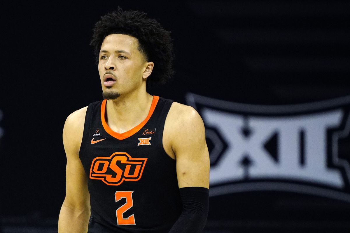 Oklahoma State Cowboys guard Cade Cunningham takes the court against the Baylor Bears during the first half at T-Mobile Center.